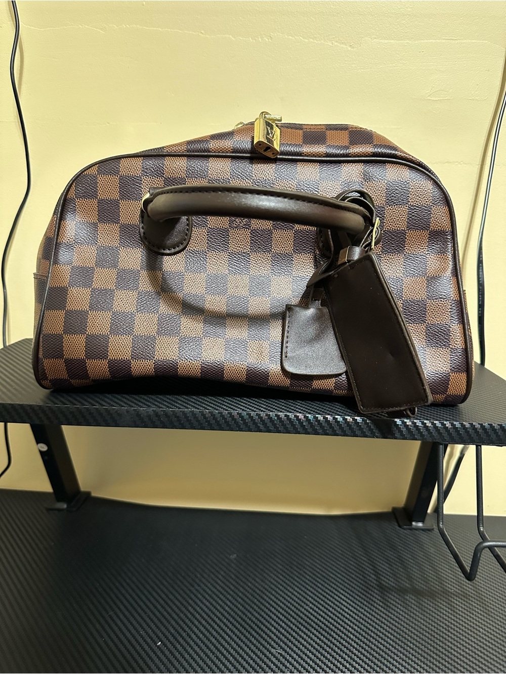 Brown checkered satchel